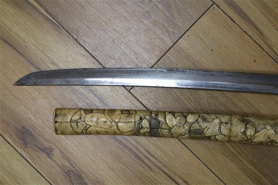 A Japanese carved bone katana short sword length 82cm